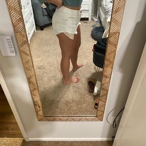 White distressed shorts